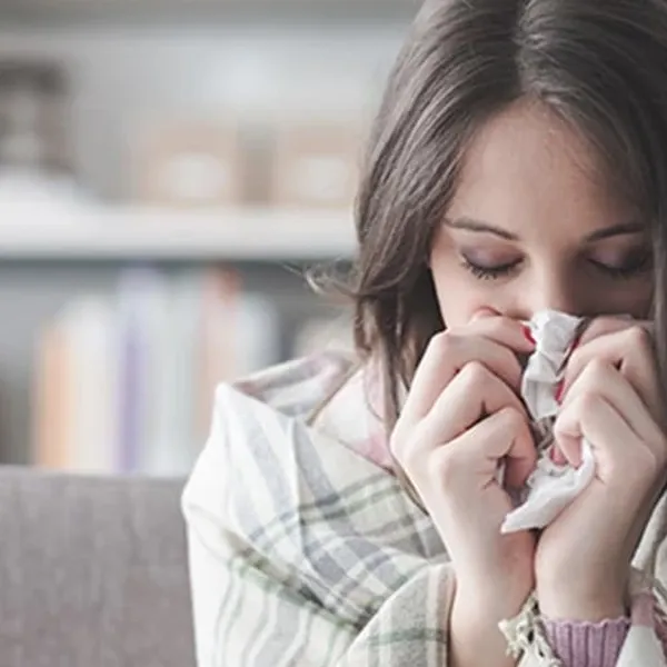 Girl Sneezing