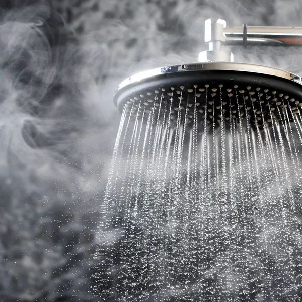 Hot shower running with steam