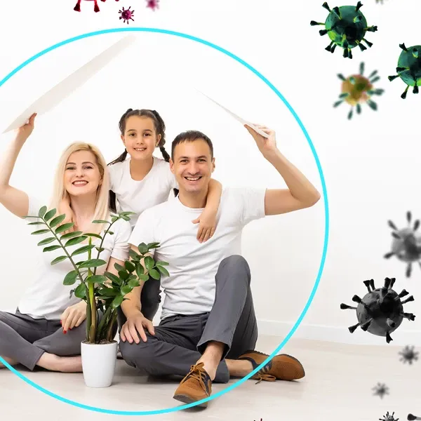 Family sitting together protecting themselves from germs
